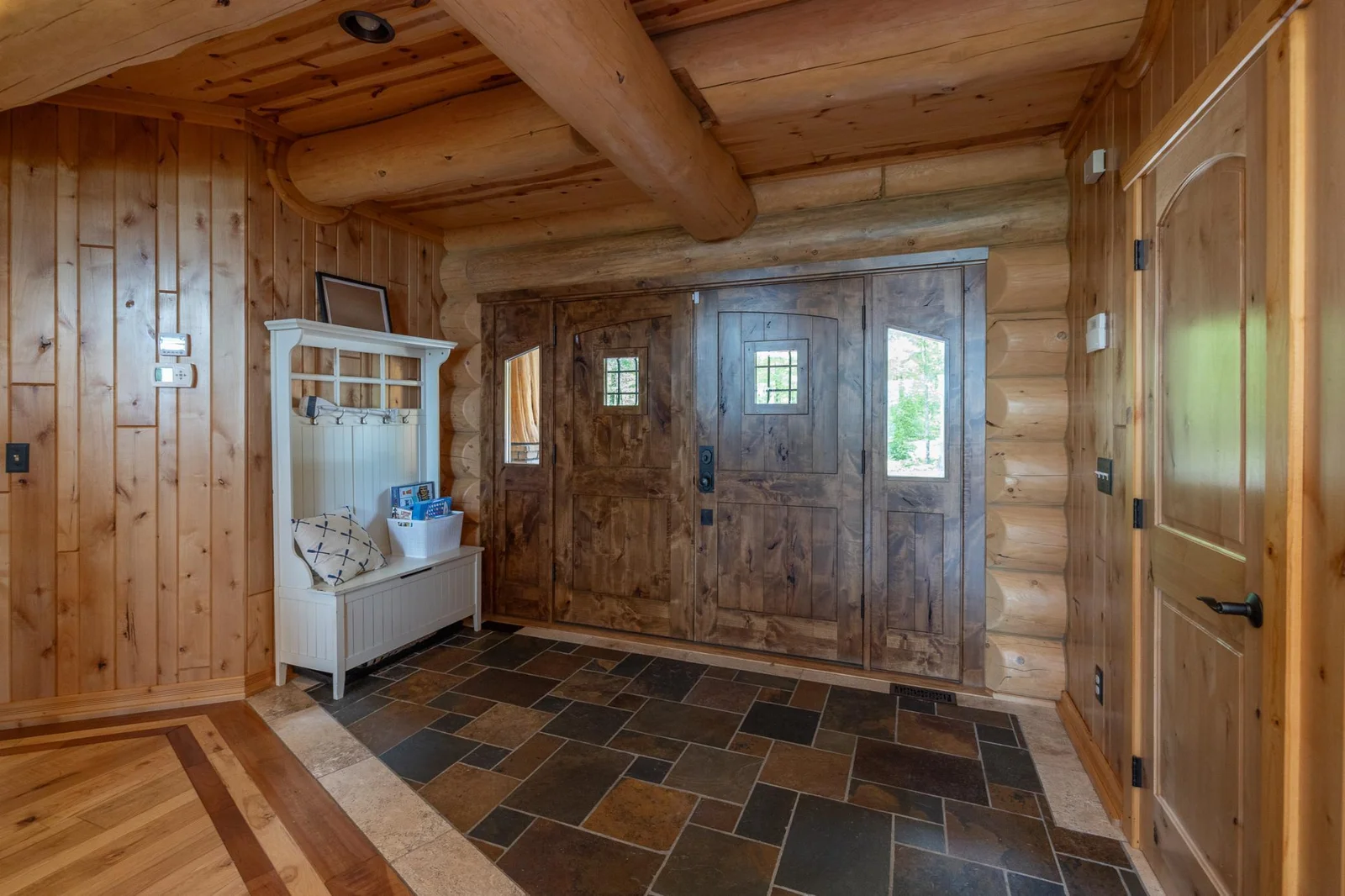 Spacious entry with slate floor