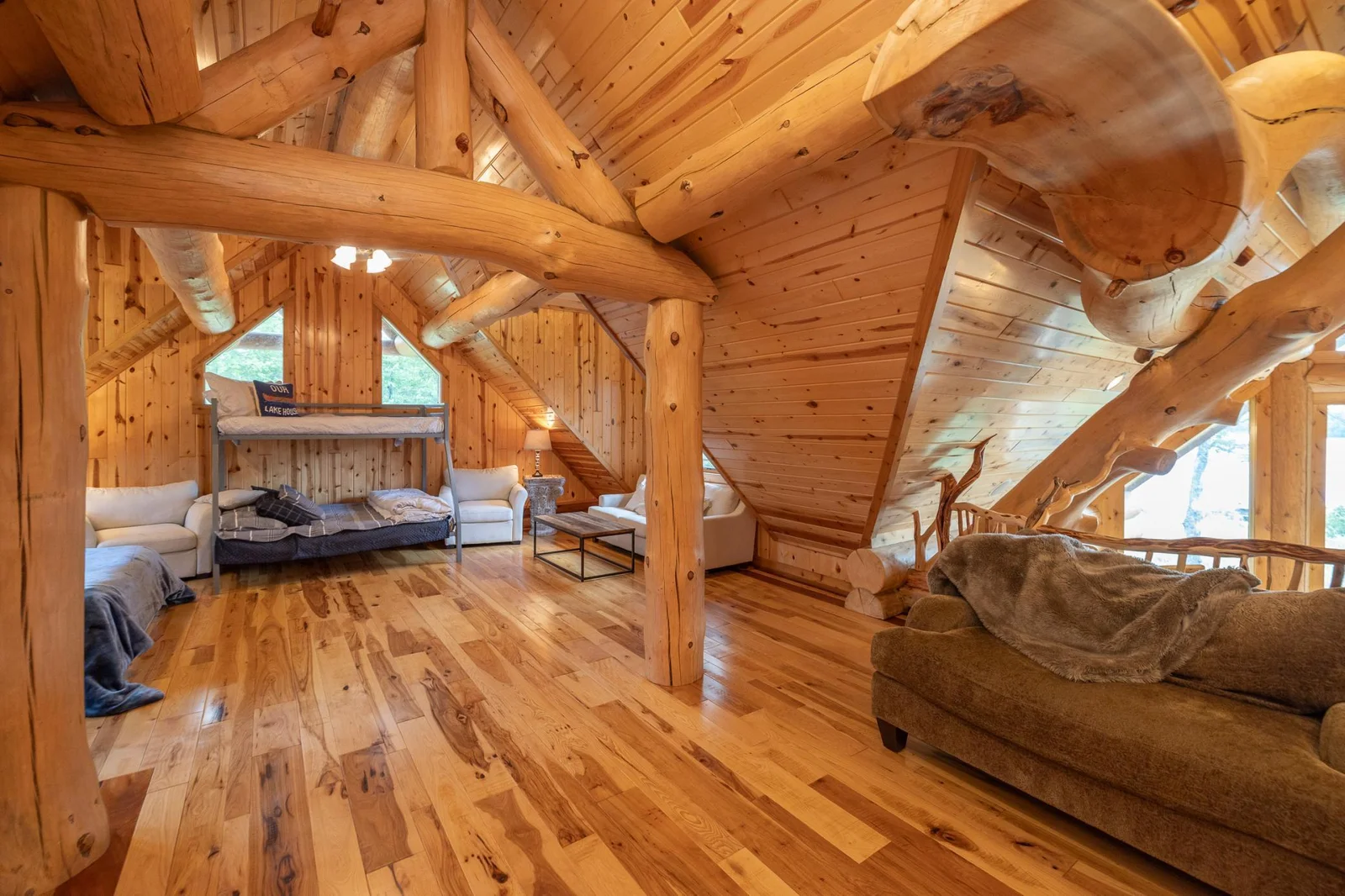 The upper level loft area presents many options. This area can be used as play area, additional family room or it can easily accommodate an additional 6-8 sleeping spaces
