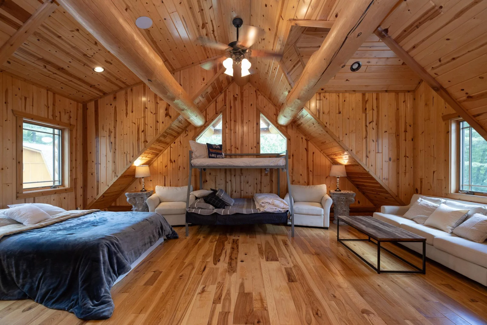 Vaulted ceilings, views of both front and back of home including lake views