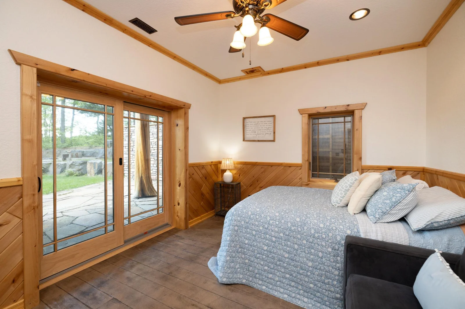 Spacious secondary bedroom with walk out to the lake