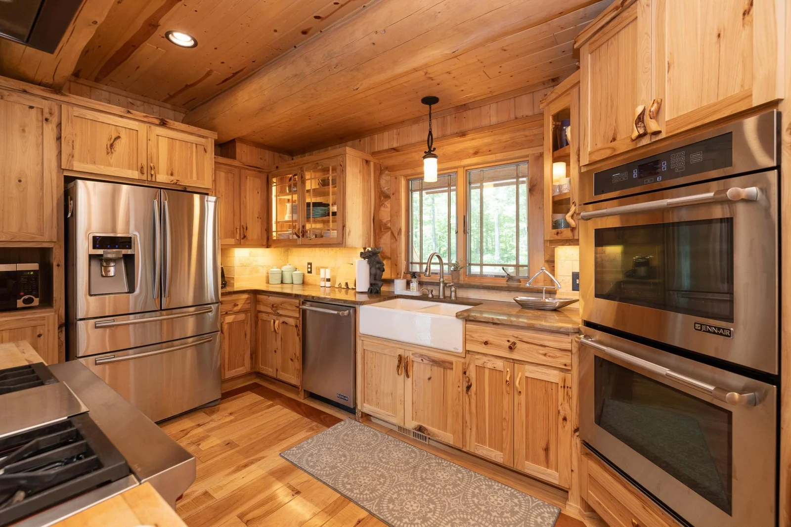 Double oven, gas stove,  stainless appliances and farm sink