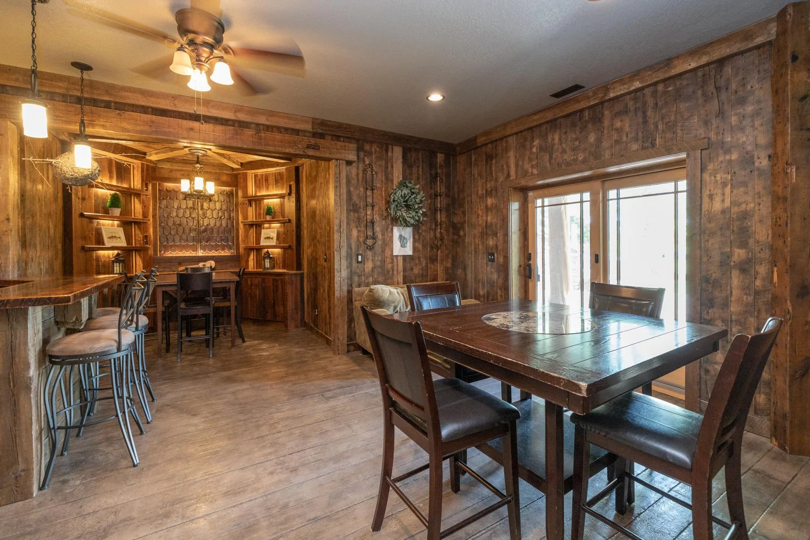 Stunning bar/game room with walkout to the lake