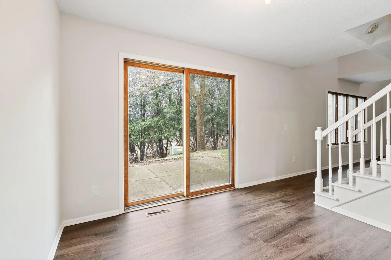 Step outside to your private patio on the corner unit, with access to trails and more!