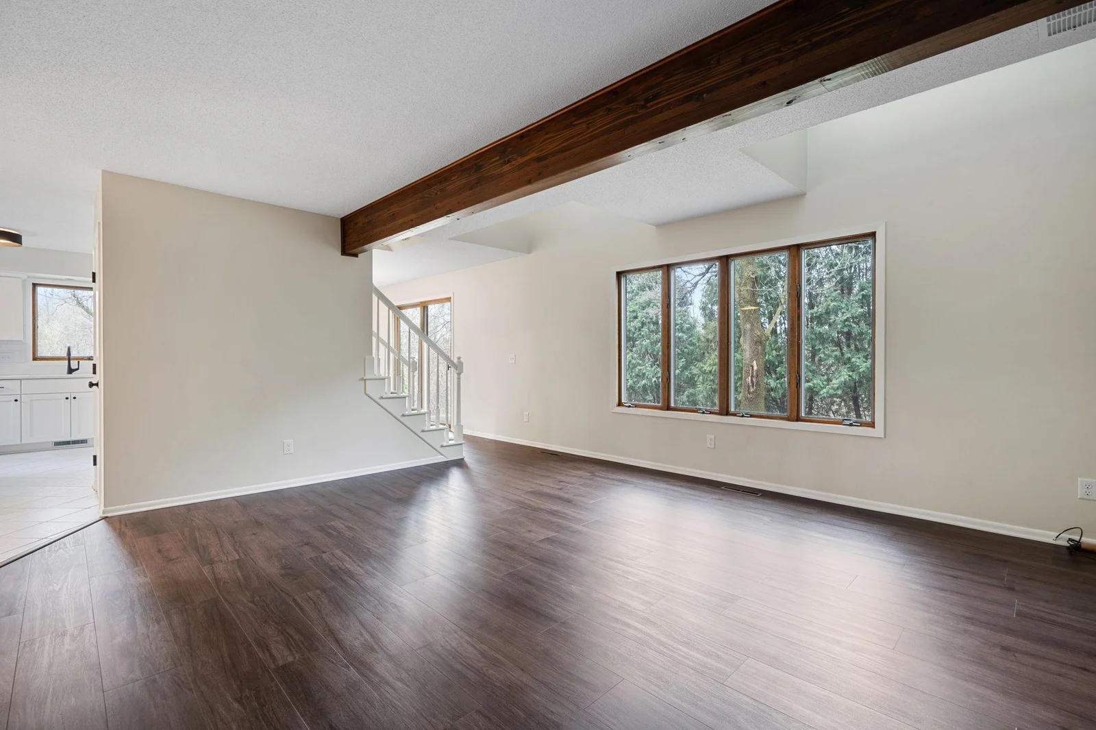 New floors, paint, and this living room is ready for your touches!