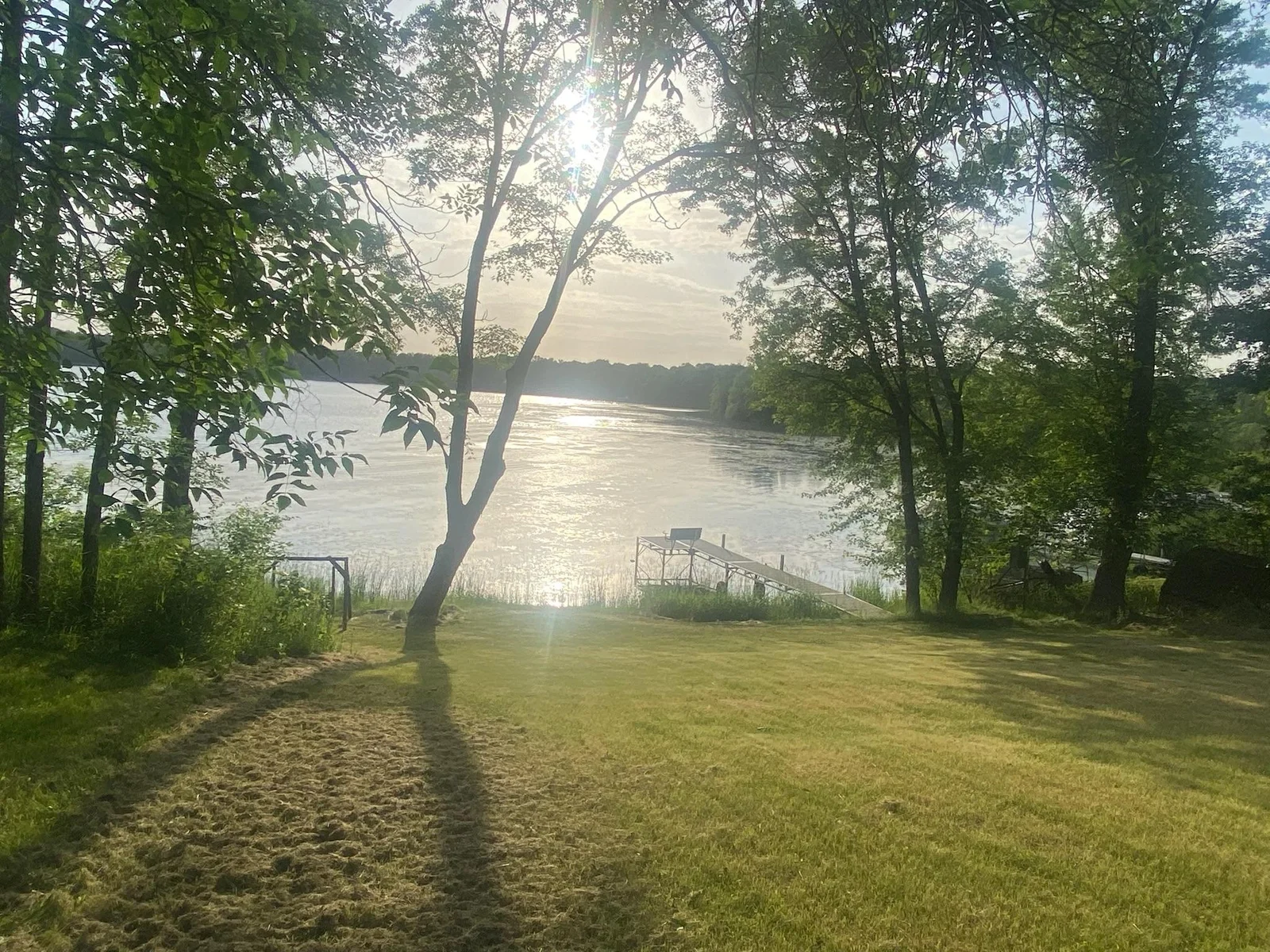 97 feet of water front! The beach needs just a bit of your TLC to reveal its sand.