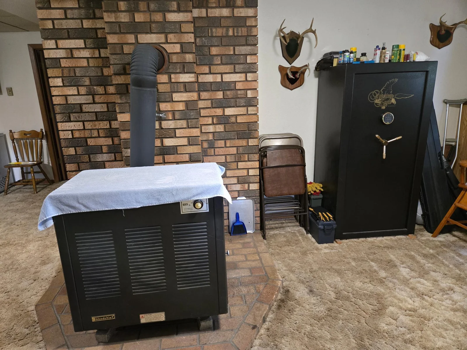 Wood Stove Heats Rec Room and Up Stairs thru Grate in Floor