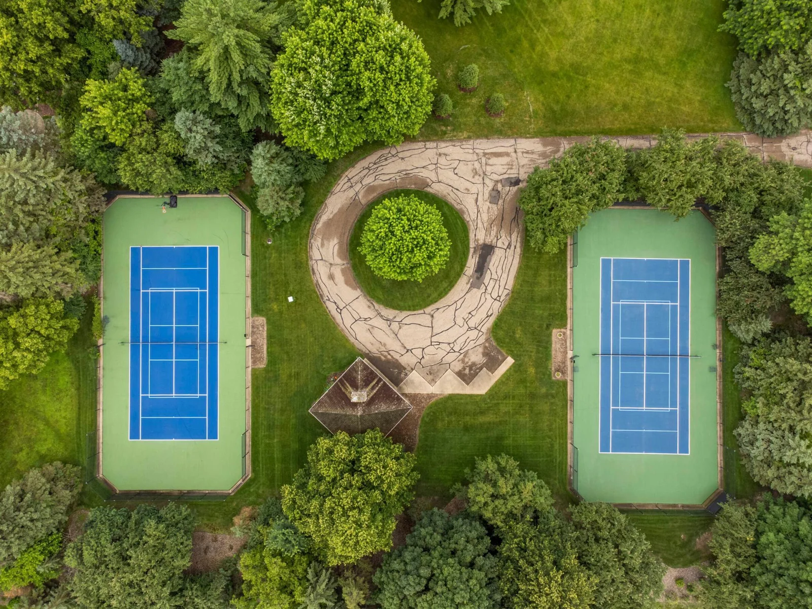 French Creek neighborhood association includes access to the tennis courts (one lined for pickleball) just a short walk from the house.