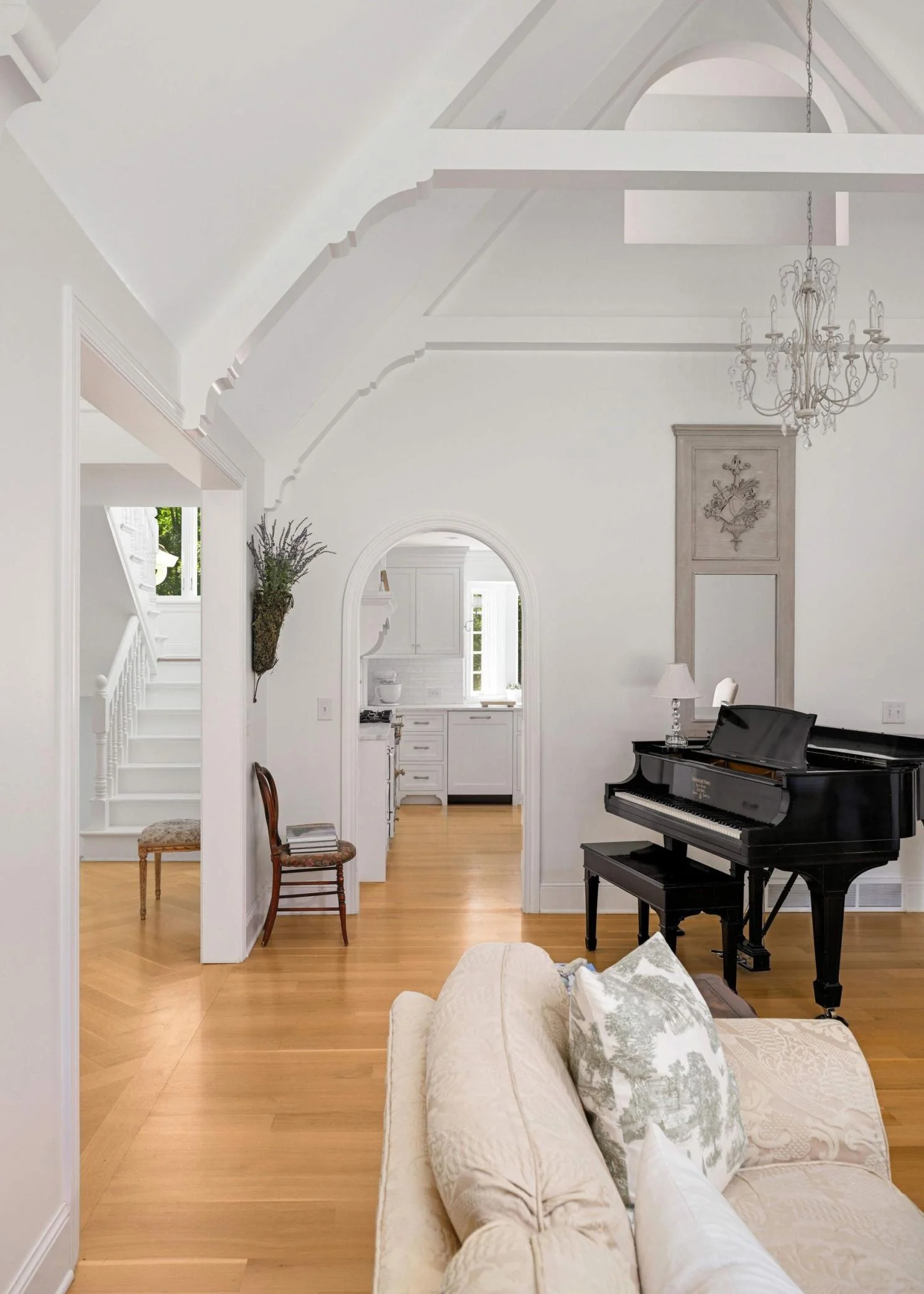 The arched openings thoughtfully correspond to the surrounding architecture, with the utmost craftsmanship.