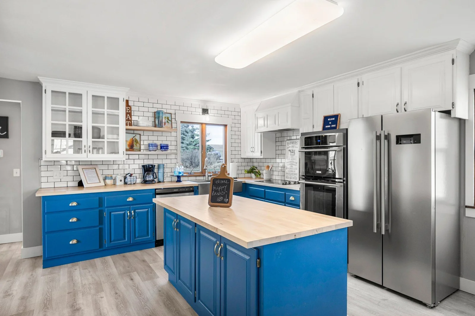 Nice large open renovated kitchen with stainless steel appliances.