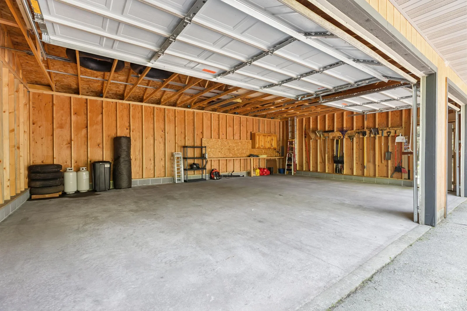 3 stall garage with 8 foot doors.