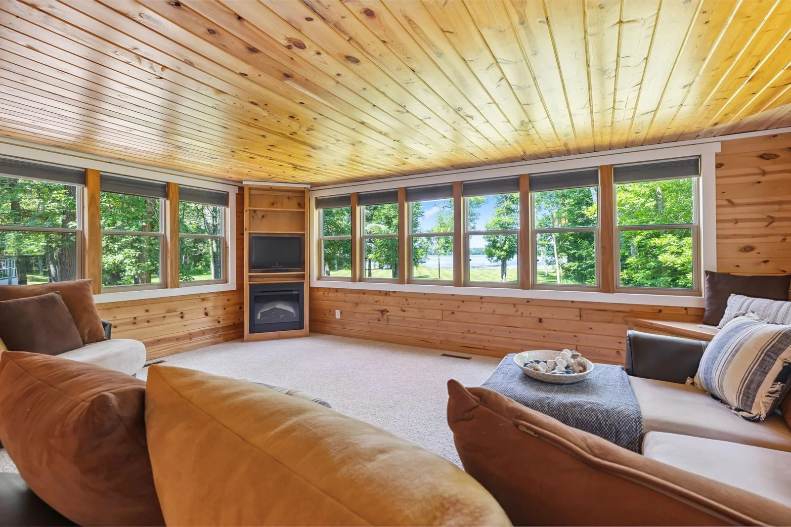 Enjoy the serenity and green views in the summer, or cozy up by the fire after you get of the snowmobile trails in the winter!
