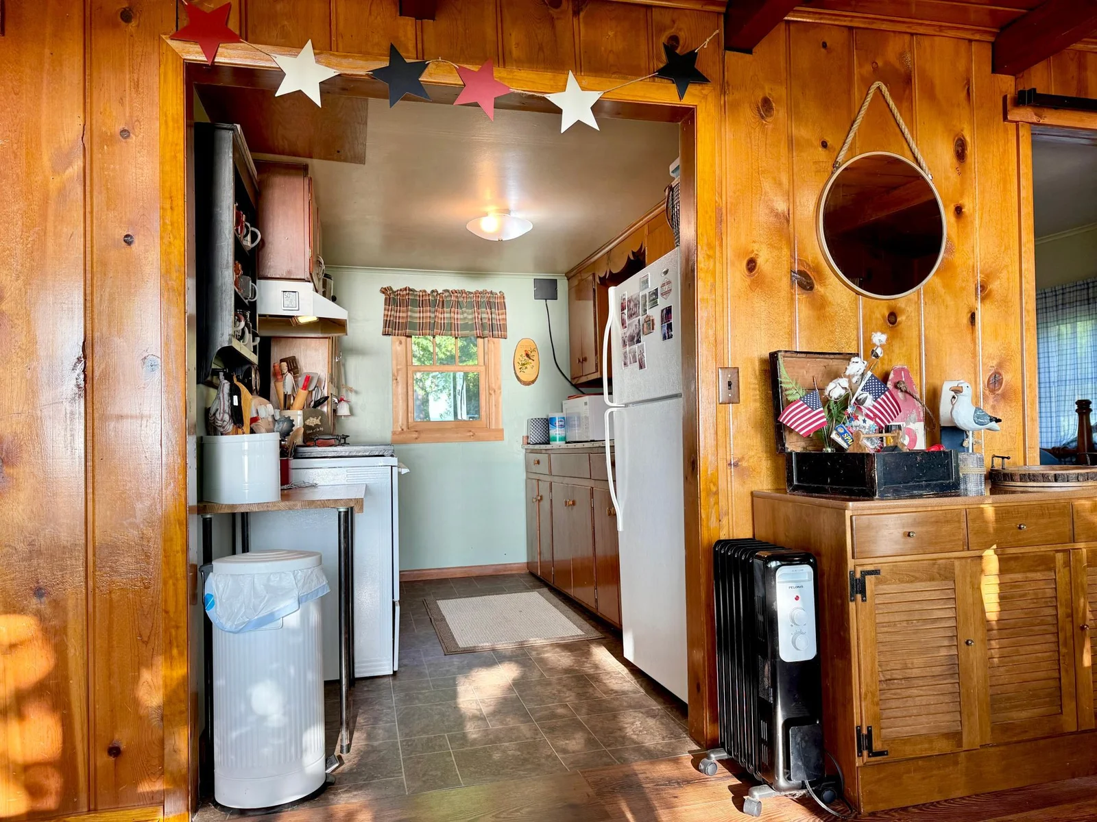 This is still inclusive to the living and dining room area but closed off enough to still feel like you have your own space to cook.