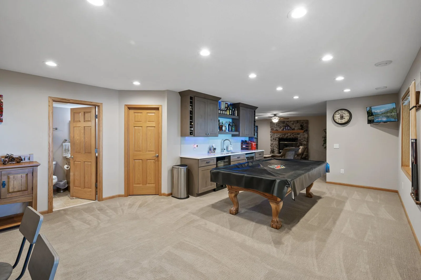 Access to the the mechanical room and another 3/4 bathroom
