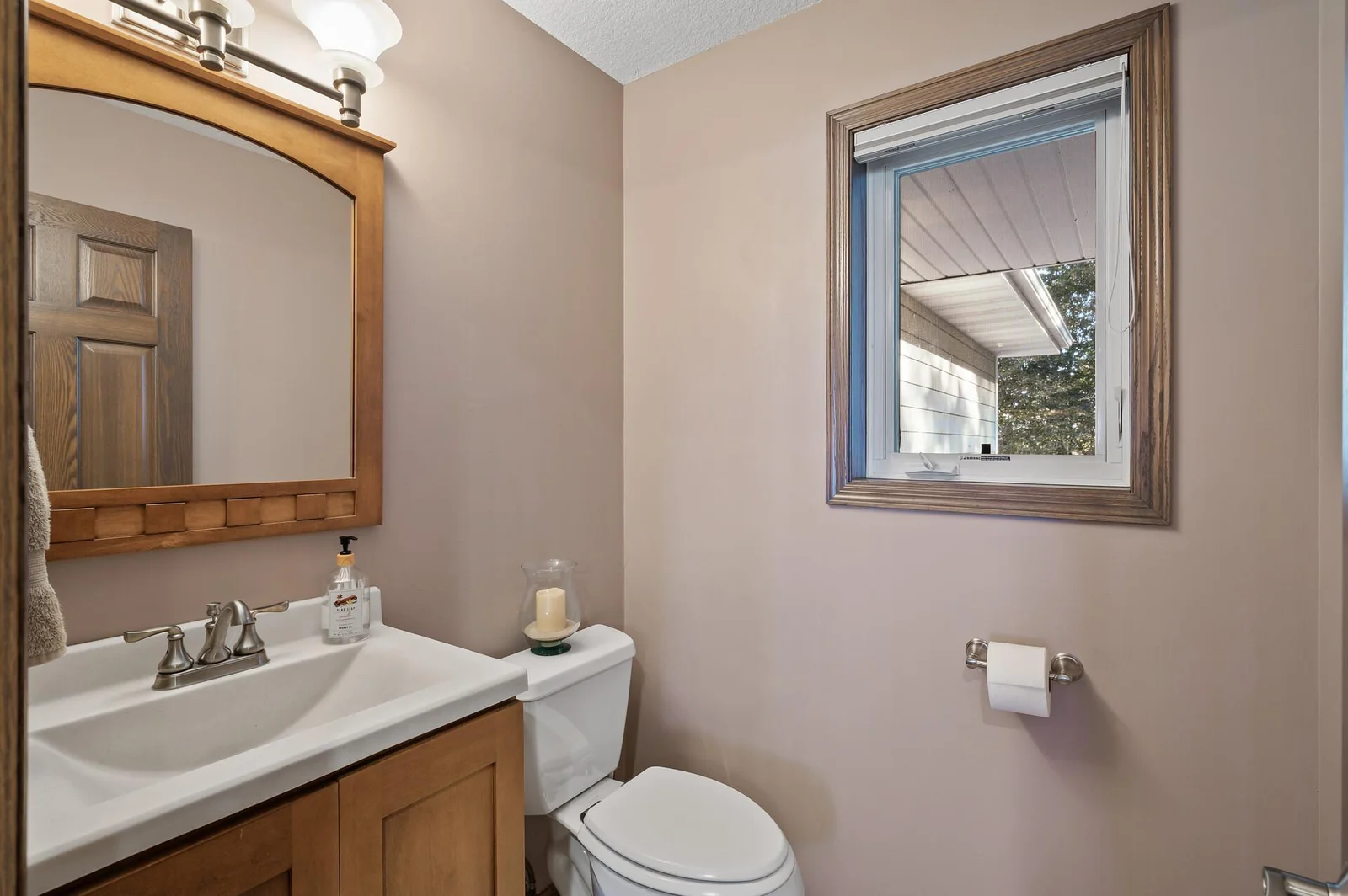 Main level powder room for guests.