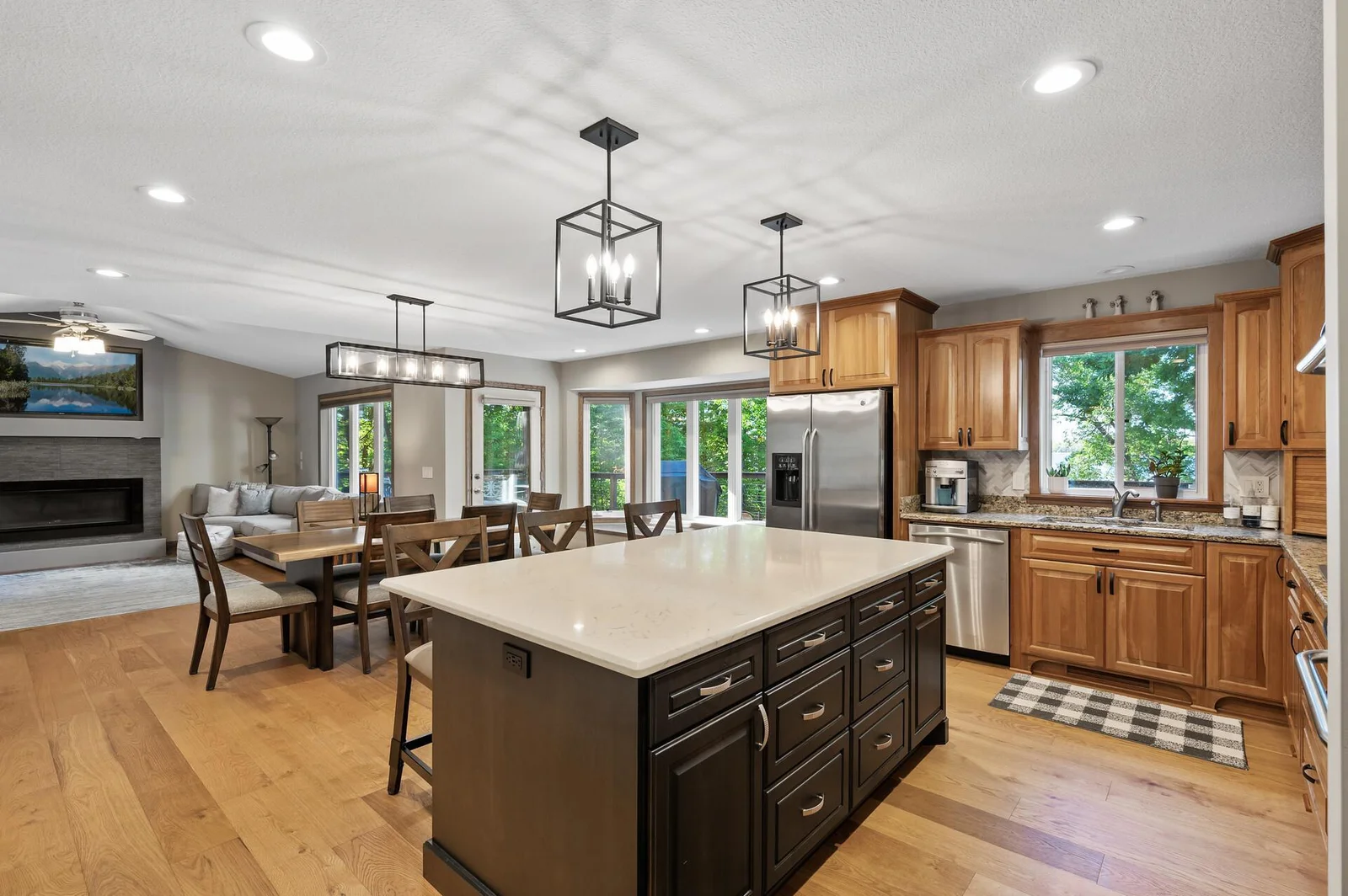 Kitchen remodeled with extended island, upgraded lighting, flooring, and so much more!