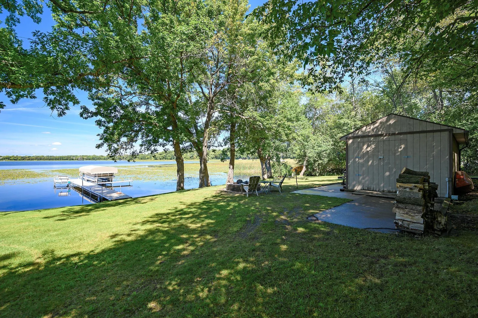 Oversized shed holds all of your lake toys right near the dock!