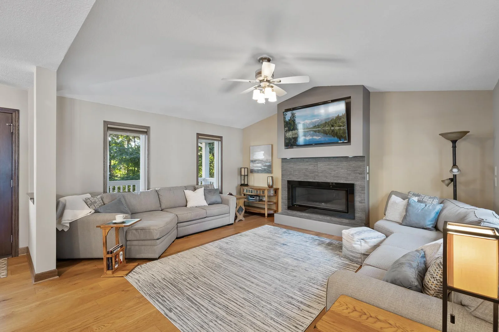 Plenty of space to entertain, cozy up, or take in the views on either side of the home.