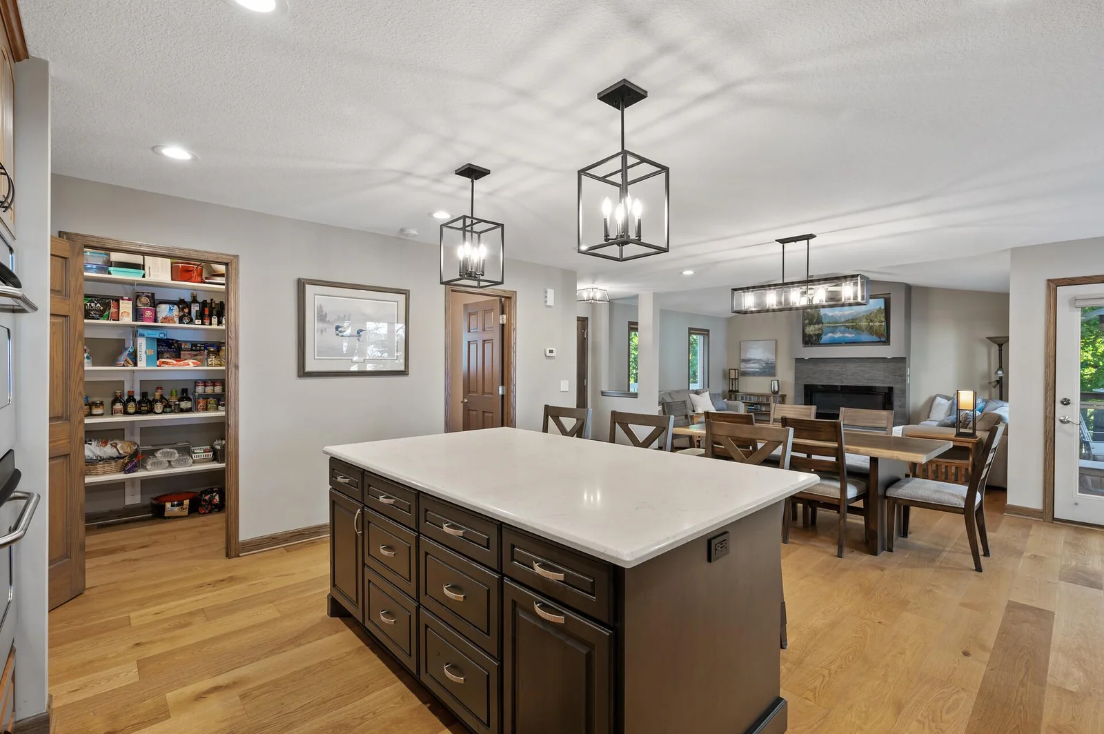 Notice the large walk-in pantry to the left of the island.