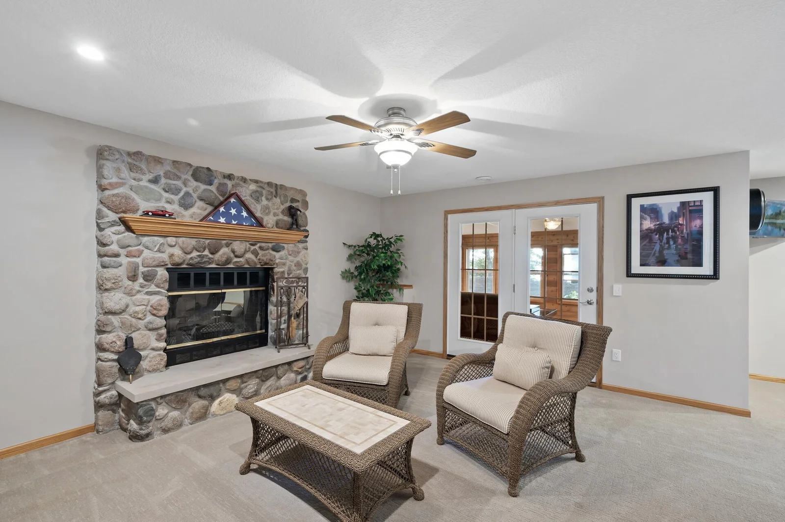 The 3 season porch is right through those french doors.