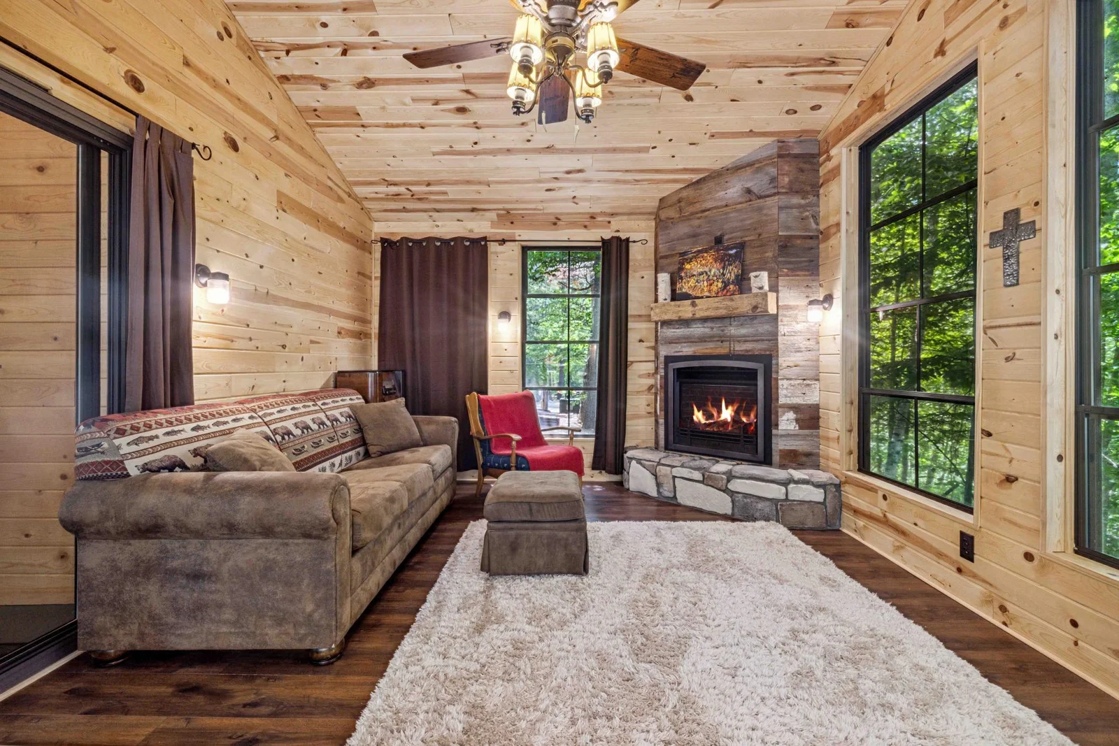 Enclosed porch with EZ Breezy Windows and Gas Fireplace