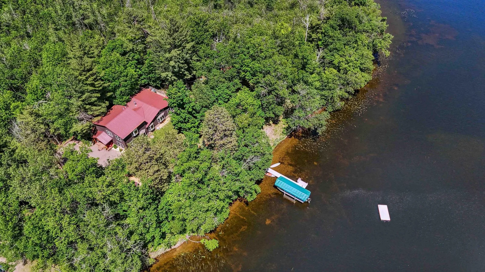 Aerial view of Nord Lake with Dock and Raft