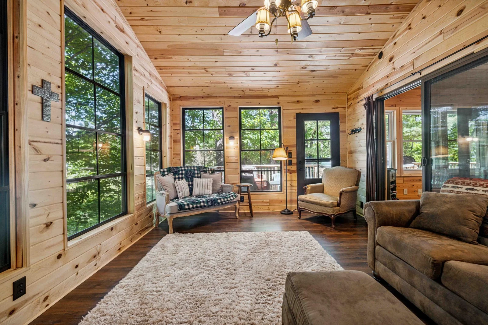 Enclosed porch with EZ Breezy Windows and Gas Fireplace
