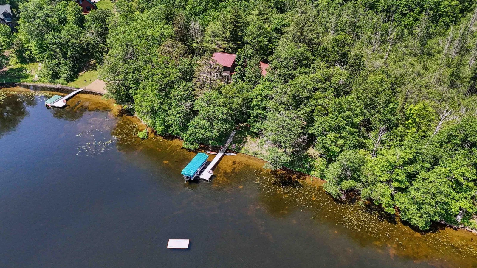 Aerial view of Nord Lake with Dock and Raft
