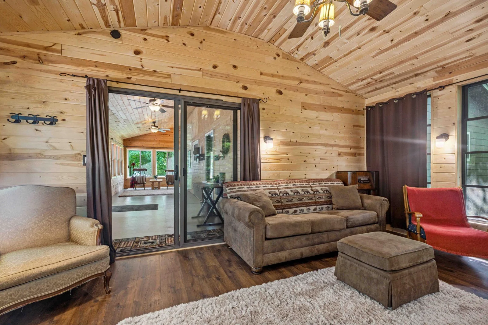 Enclosed porch with EZ Breezy Windows and Gas Fireplace