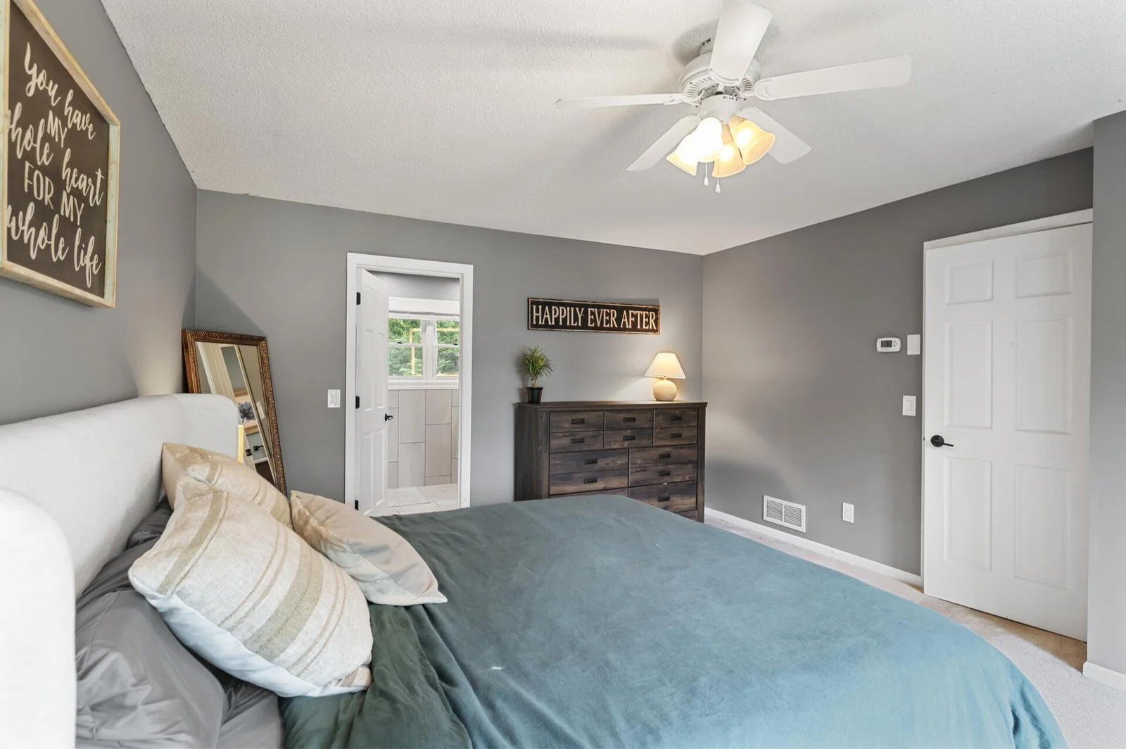 Primary bedroom with full bath