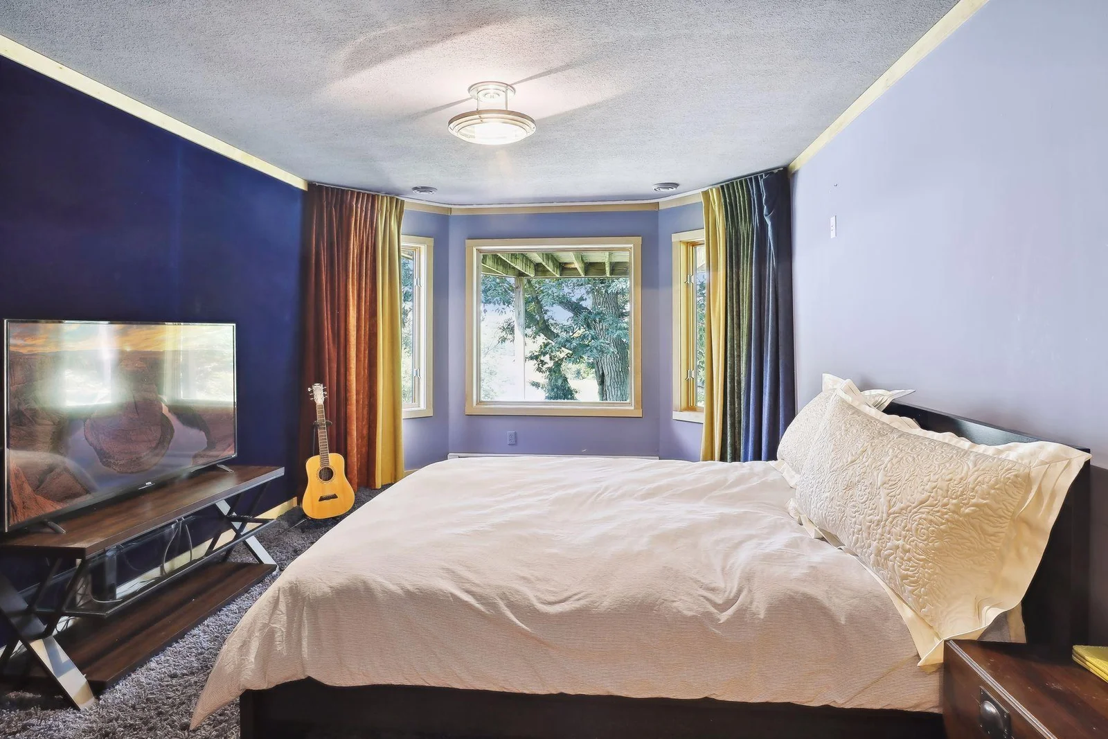 Fabulous 5th bedroom in the lower level features its very own lake views!