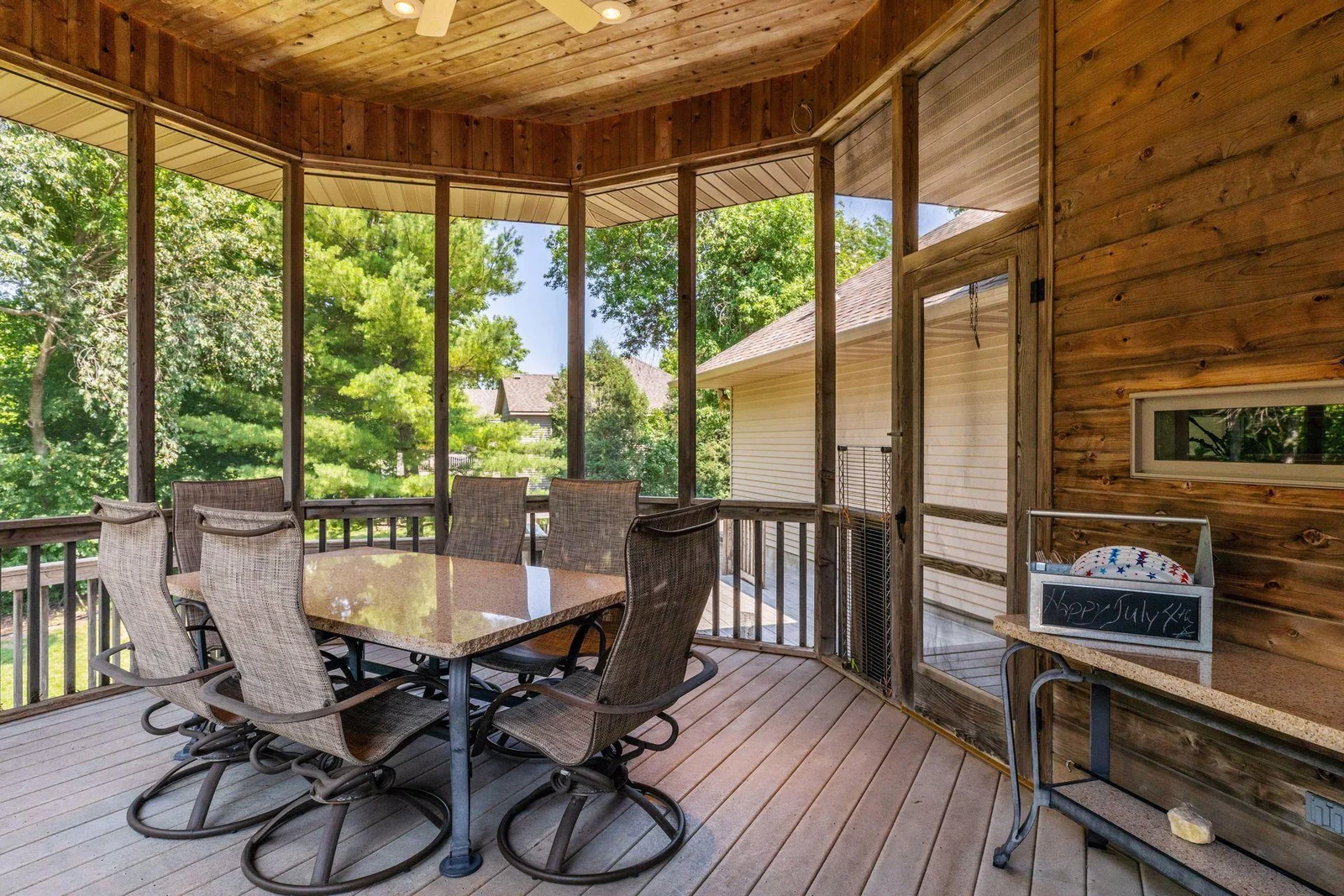 What an awesome, 3-season porch located off kitchen! This is the 2nd of two screen porches on the back of this home.