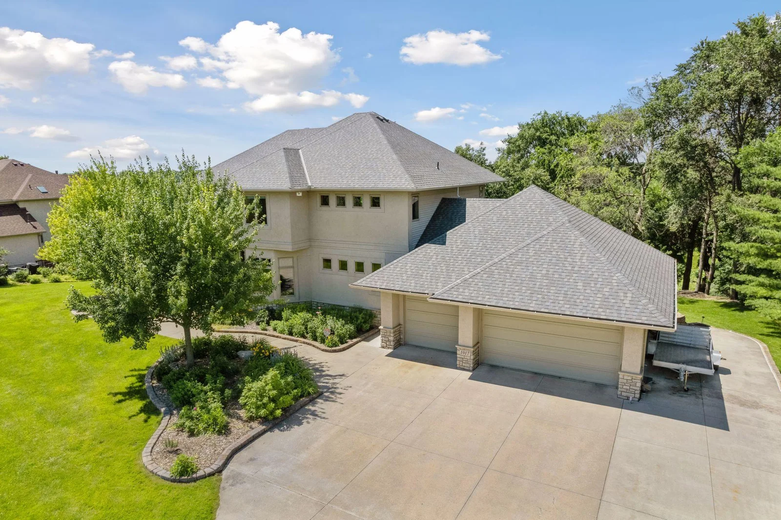 Standout curb appeal and full concrete driveway!