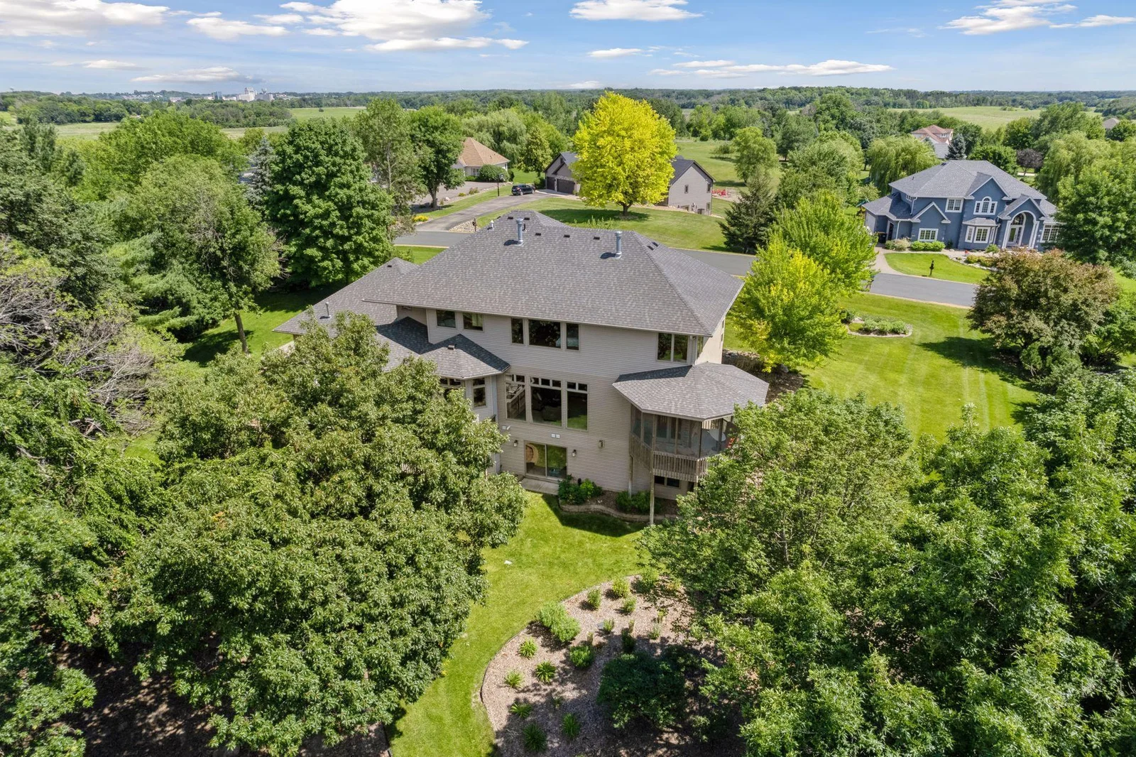 Serene treed and lake views! Fantastic neighborhood with privacy and large lots.