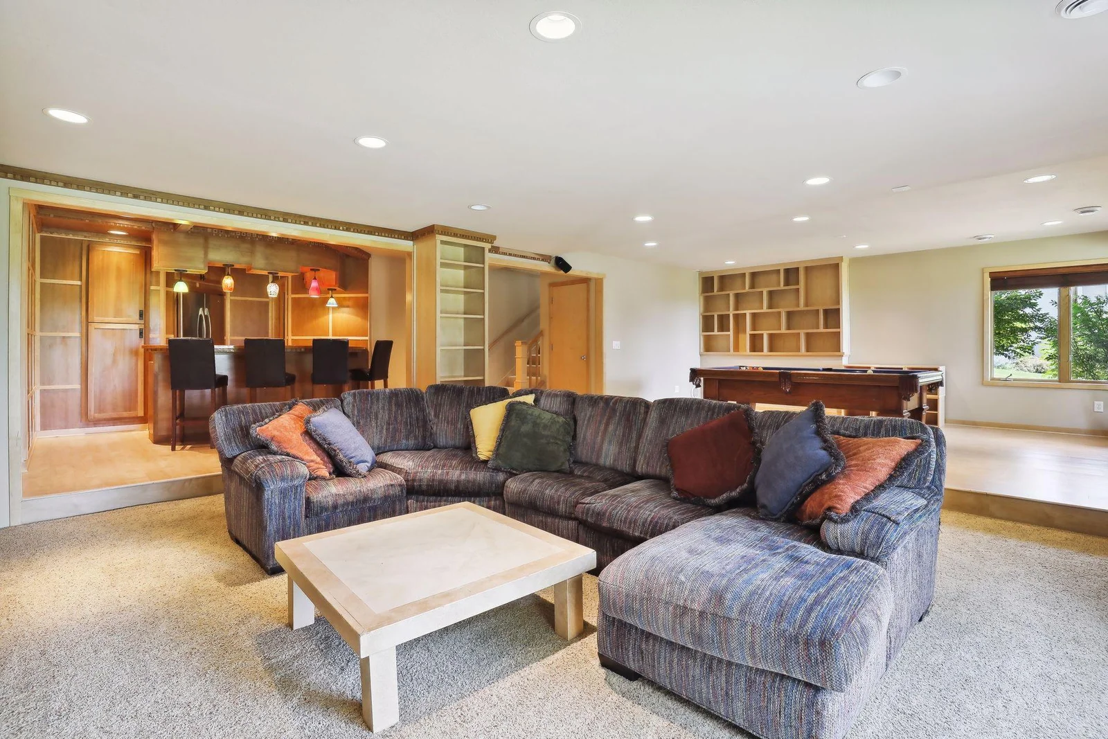 Entertainment delight, bar and amusement space, walk out to private lake setting. What more could you want?