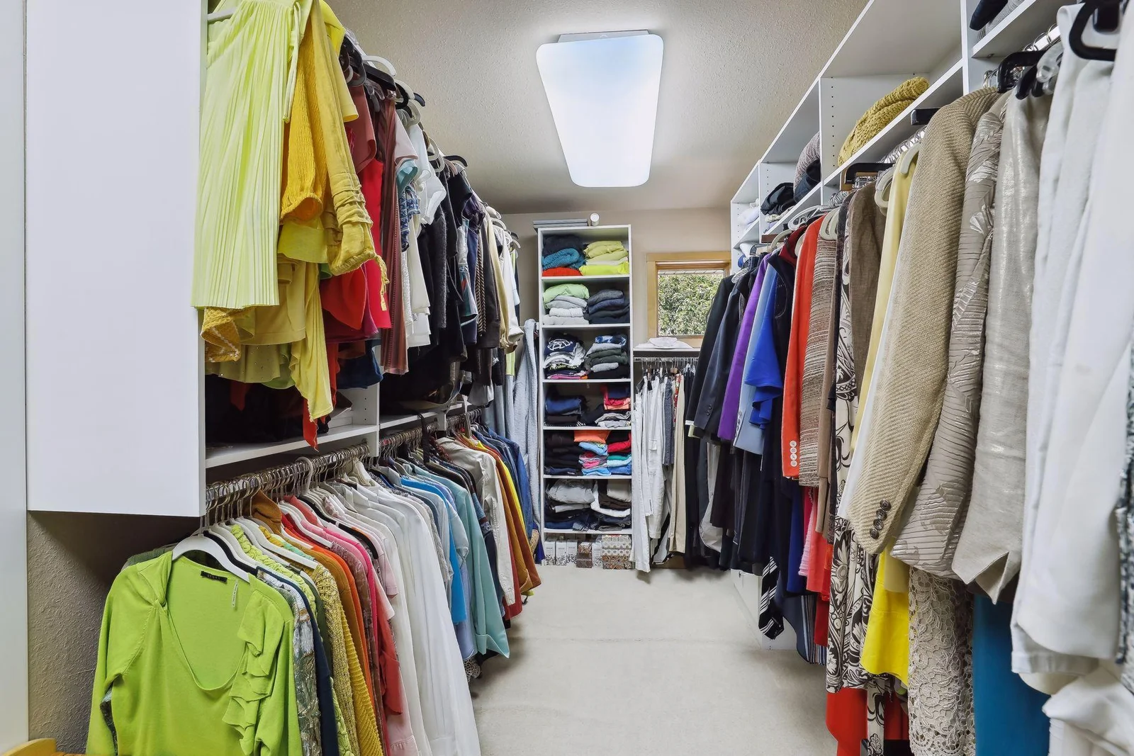 Hello DREAMY closet! Great storage and built-ins. Fabulous windows make this space light and bright!!
