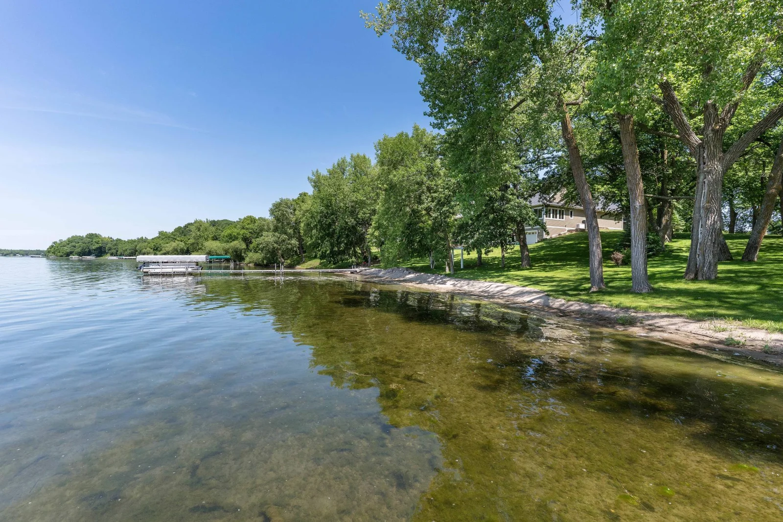 large yard with plenty of trees for shade and beauty!