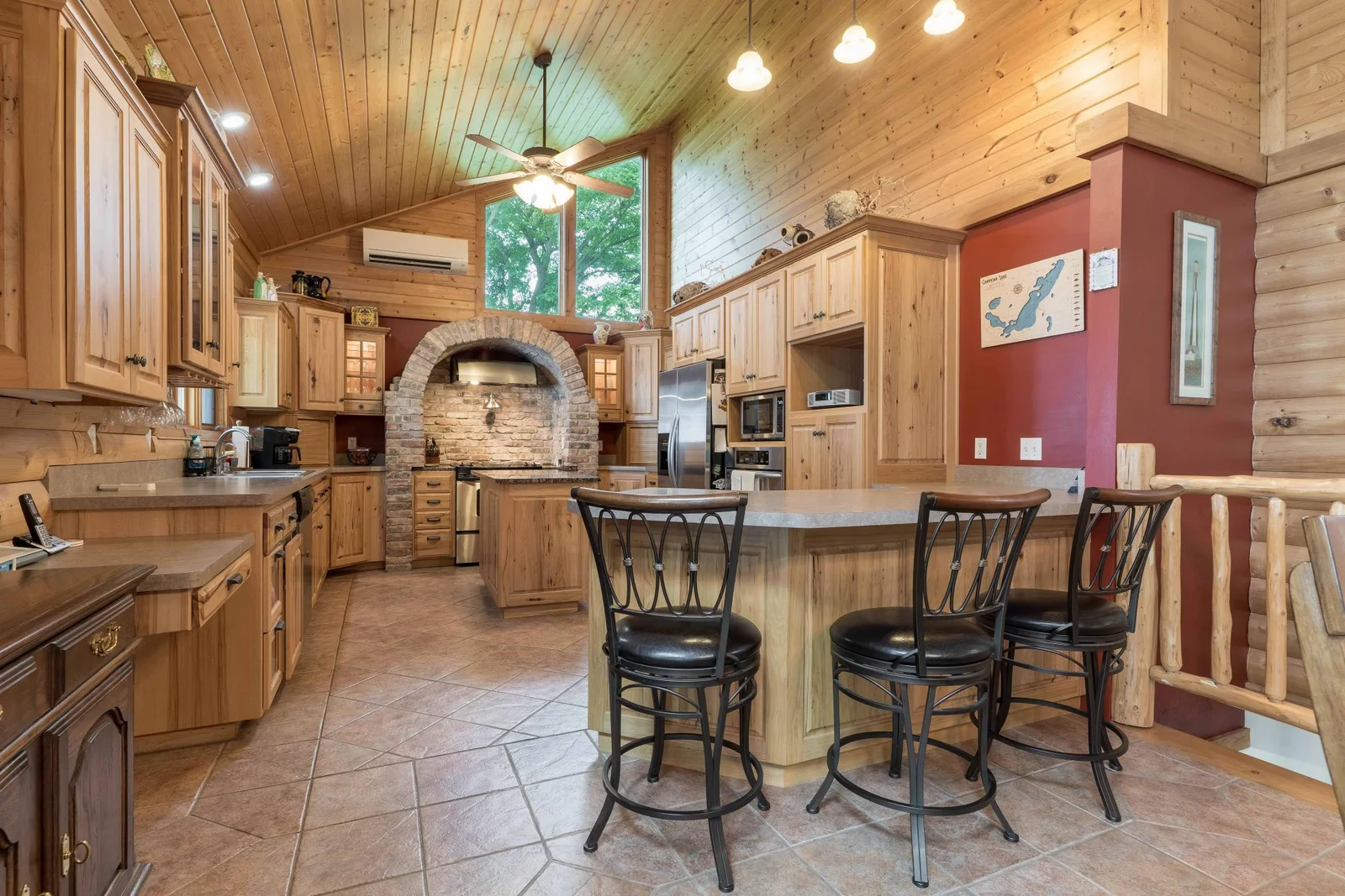 large Kitchen with Center island and peninsula.