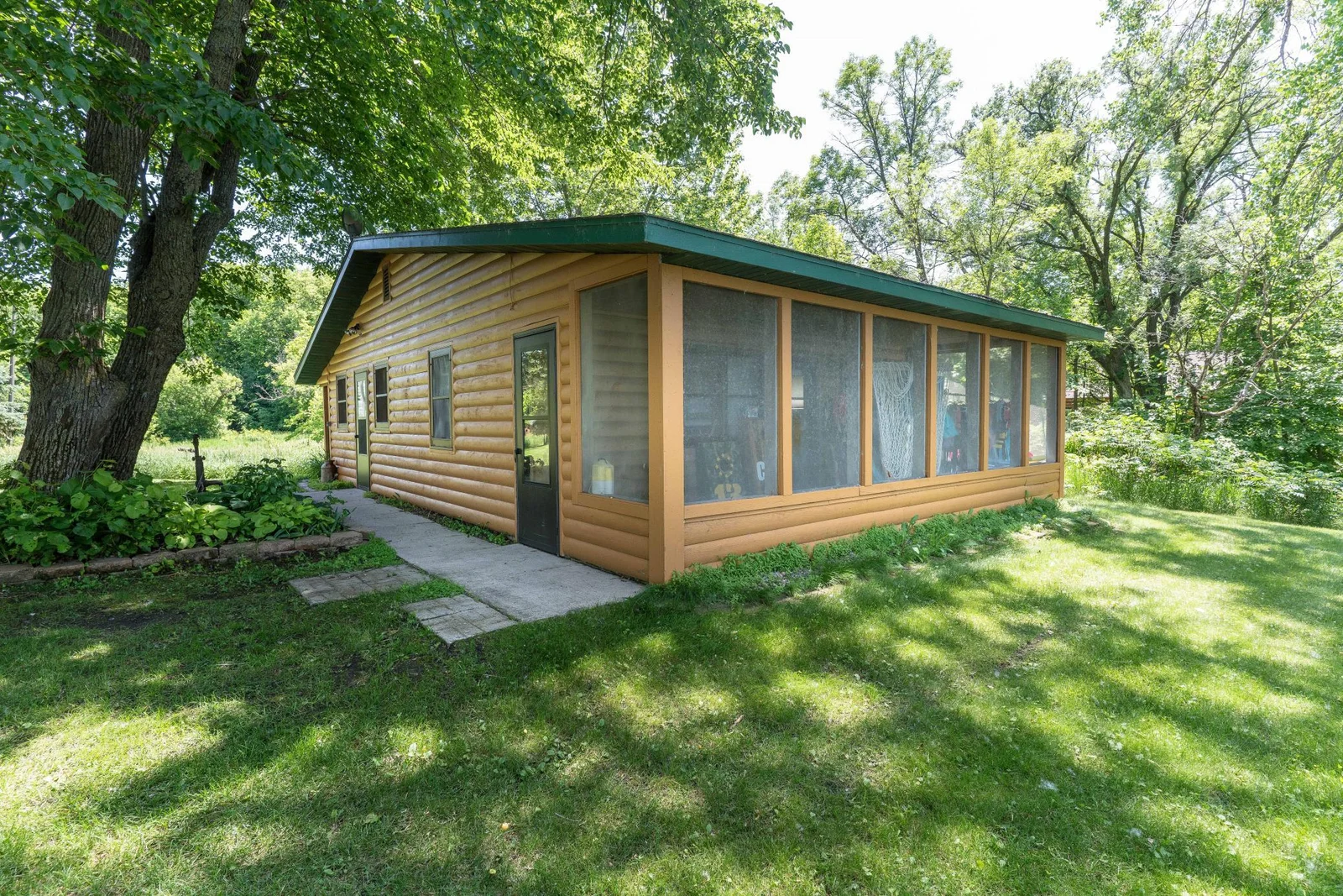 Bunk house complete with Full Screen Porch to lake with panaramic views.