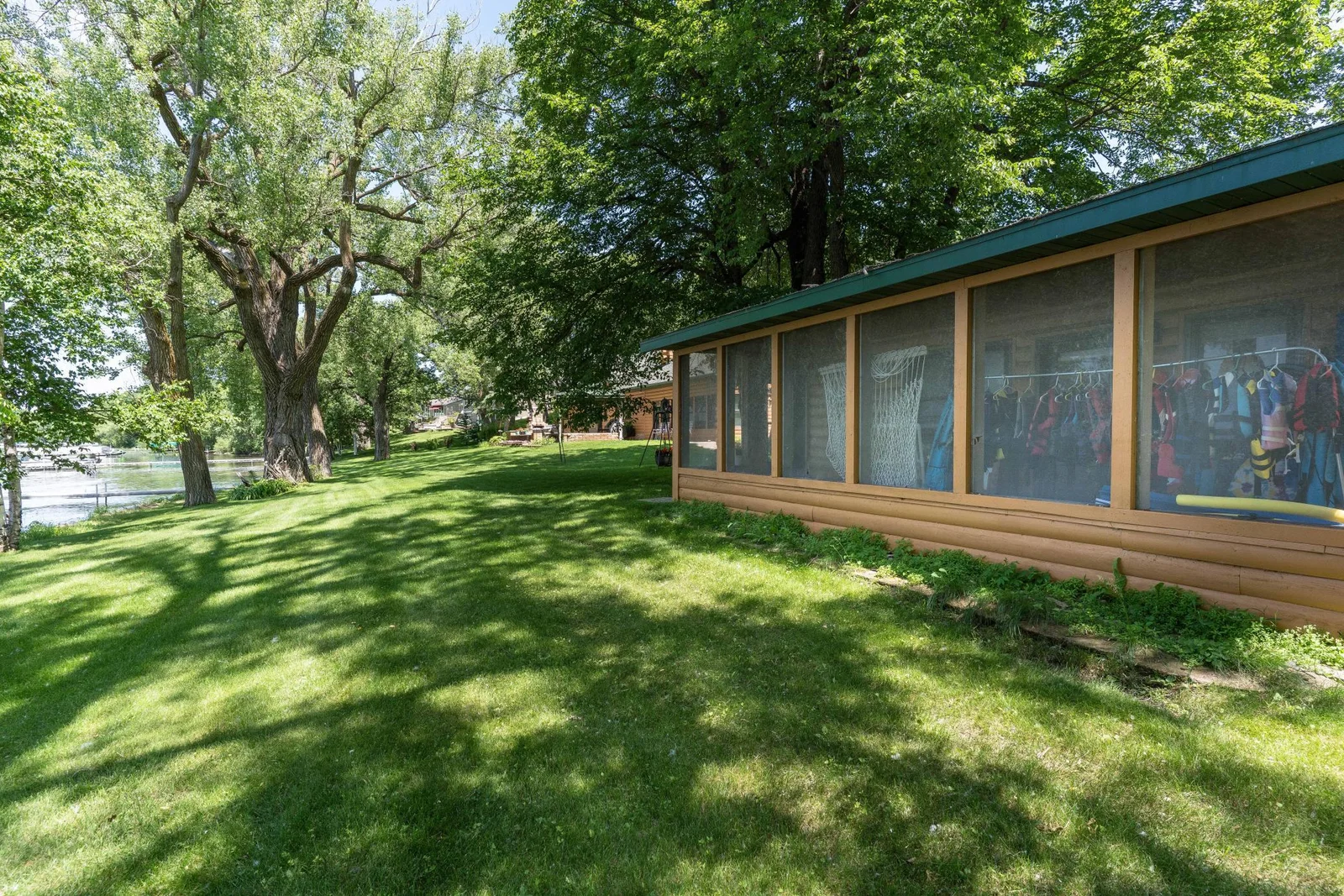Enjoy this beautiful property with 225' of shoreline & close proximity  to lake