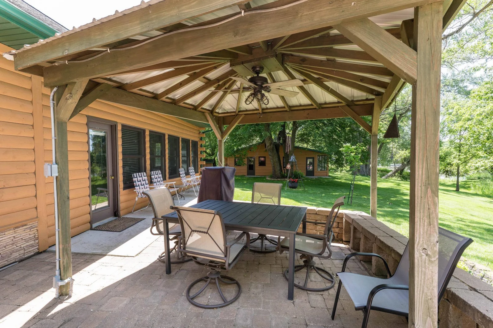 pergola looking to Bunk house.
