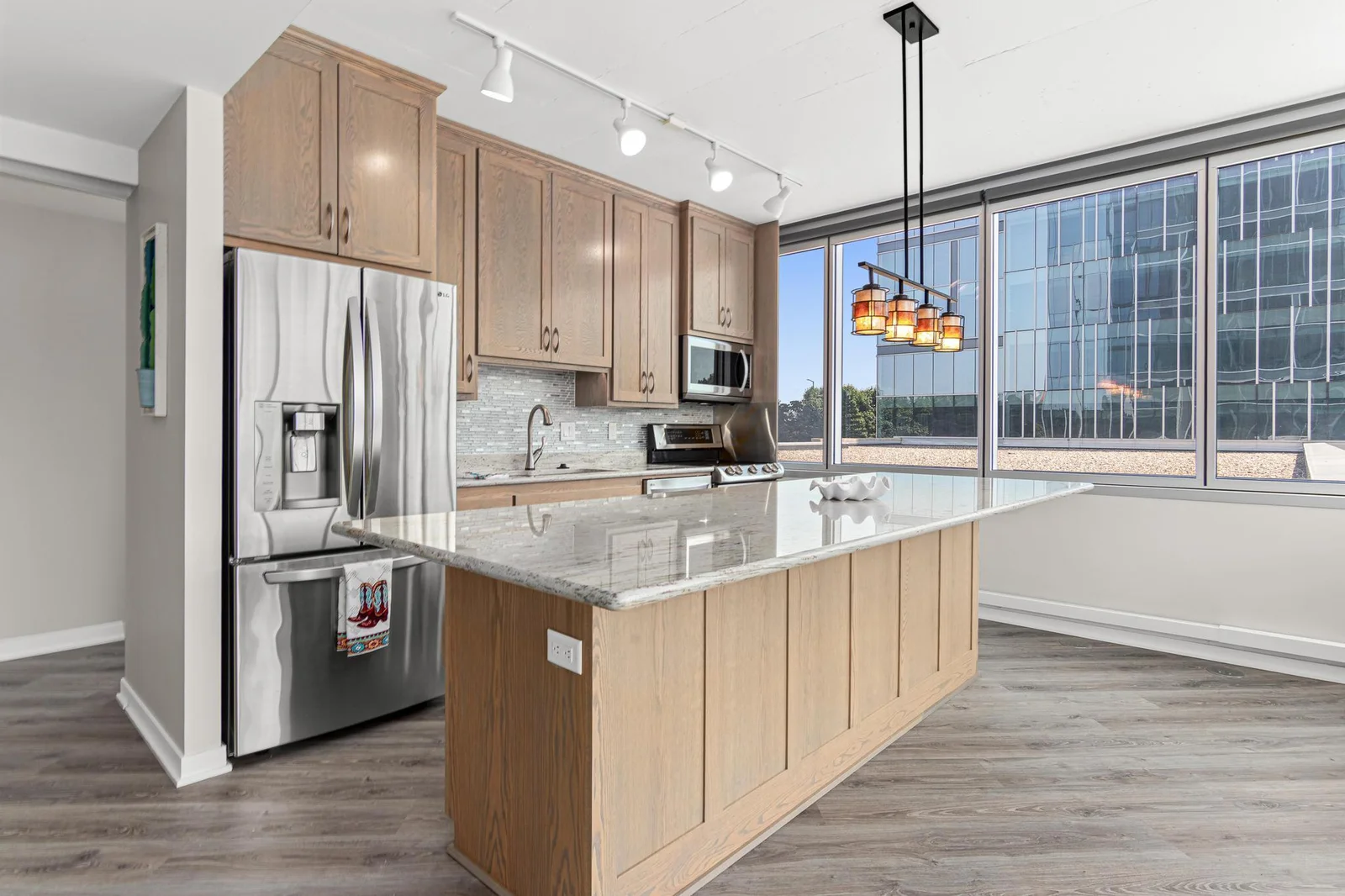 Open Kitchen with Large Granite Island w/Room For Stools
