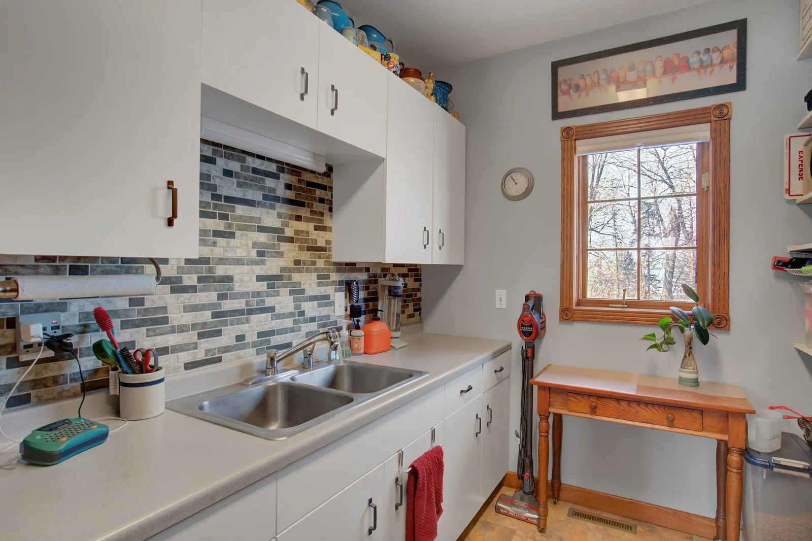 Additional Mudroom with sinks, storage, and Half Bath