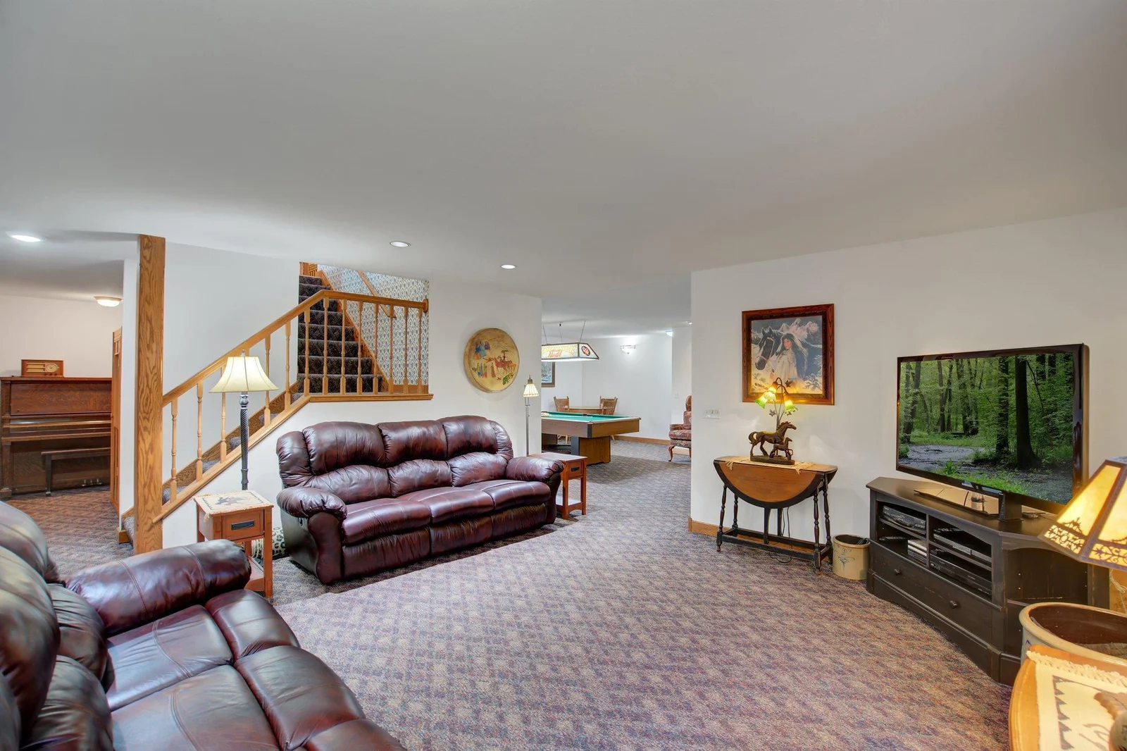 Family Room in Lower Level with built-in wet bar