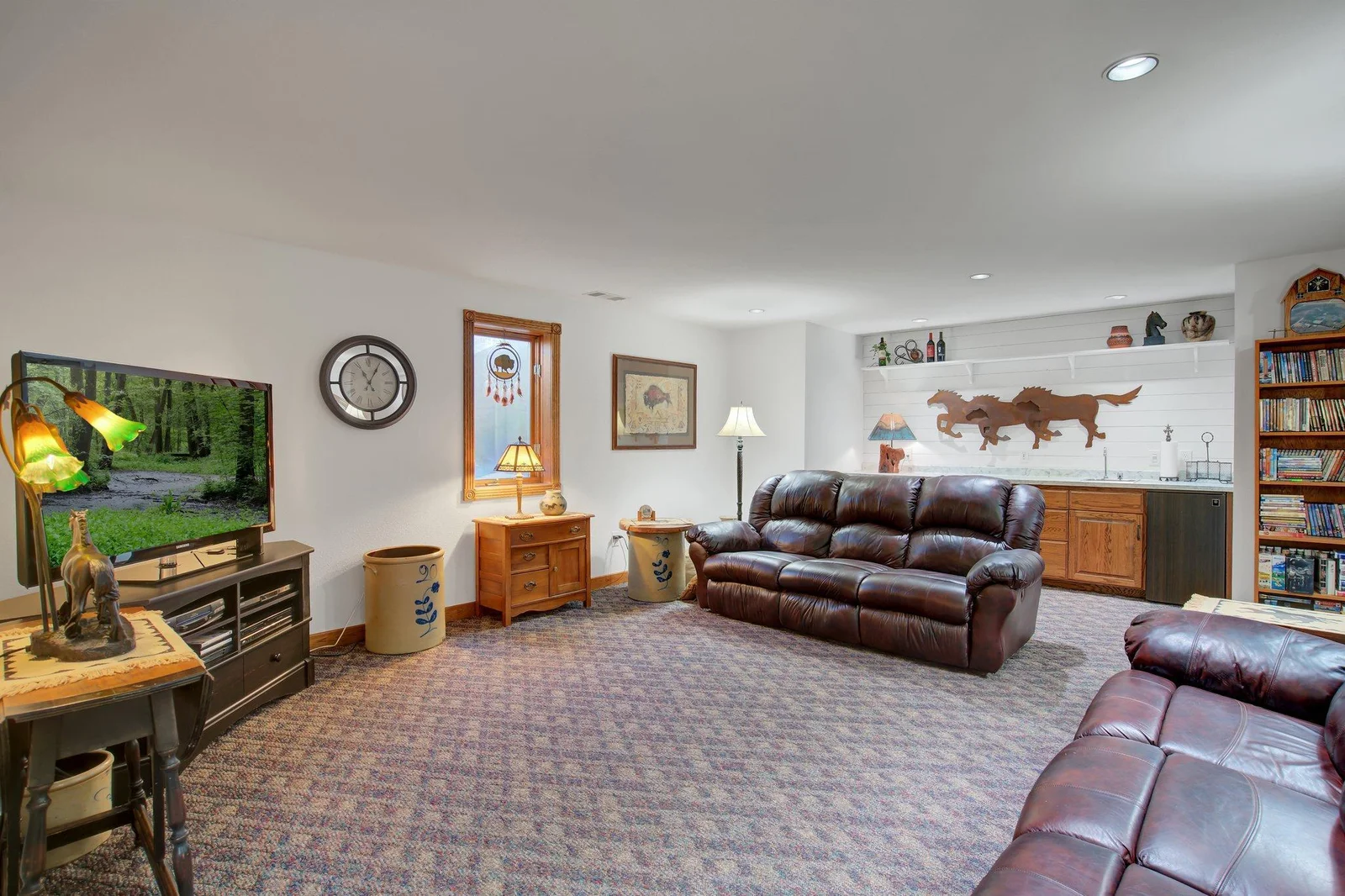 Family Room in Lower Level with built-in wet bar