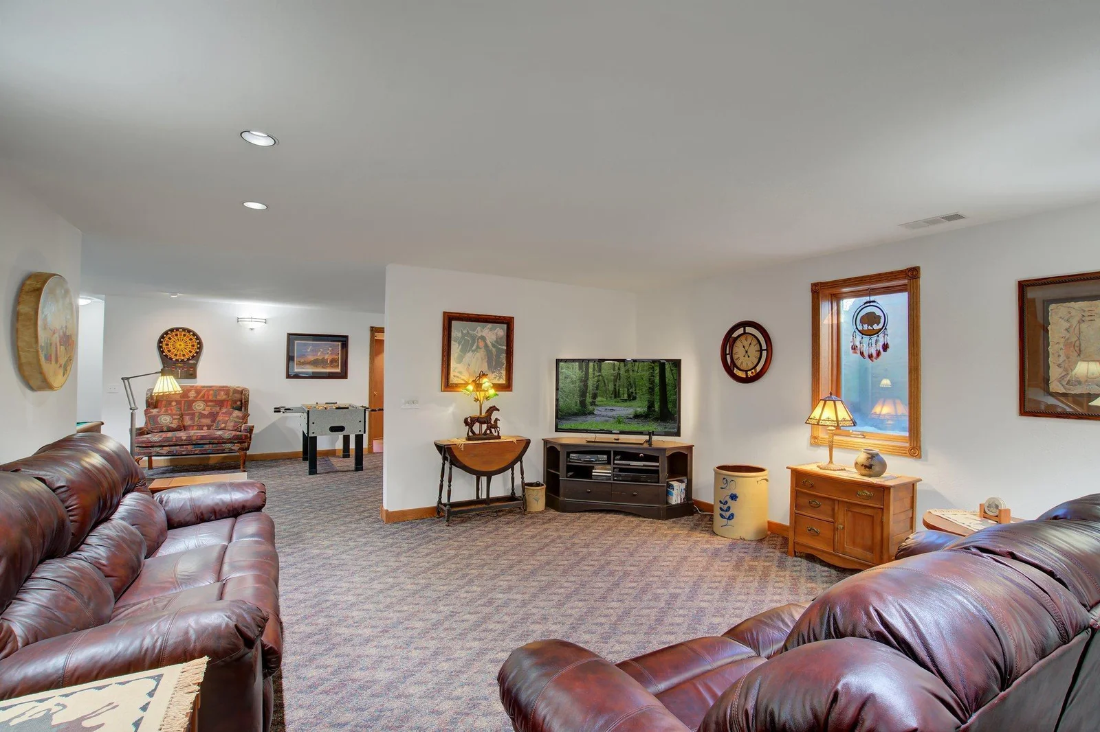 Family Room in Lower Level with built-in wet bar