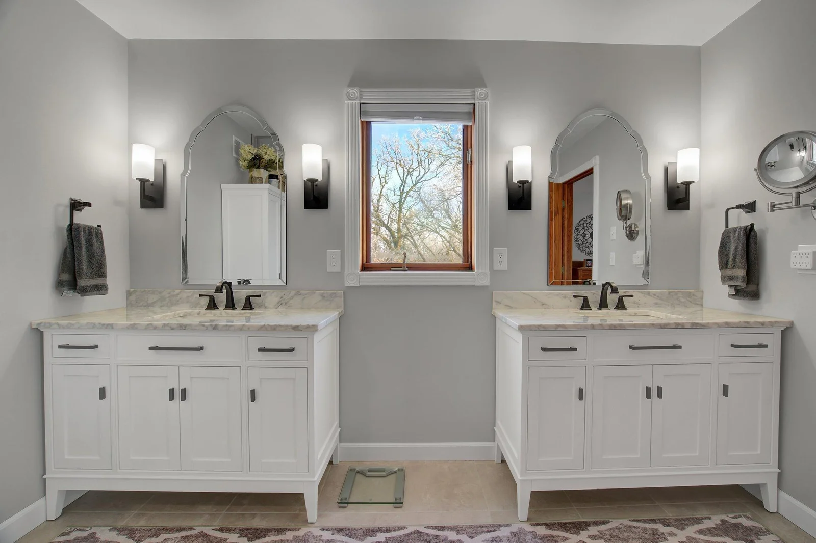 Renovated Primary Bath with double sink vanities, storage, and oversized custom shower