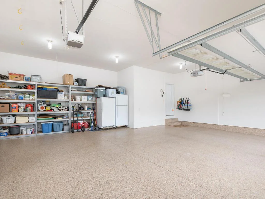 3-stall Garage has polyurea floor.