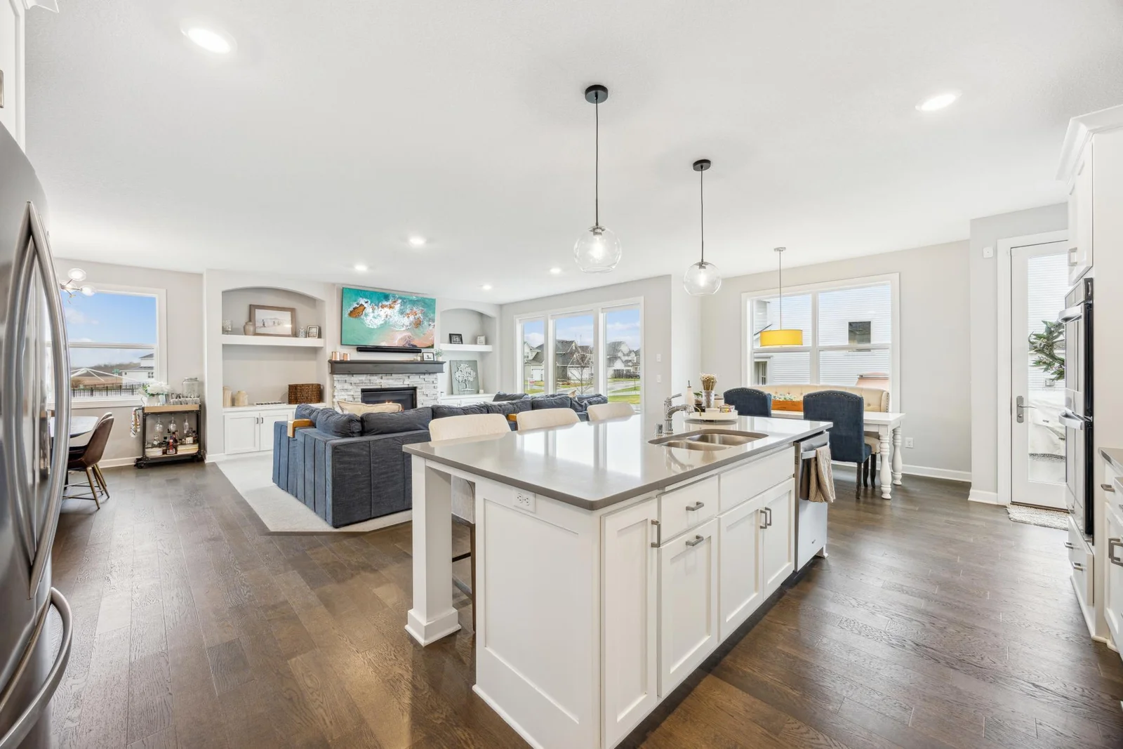 The cook can stay in the action in this wonderful kitchen.