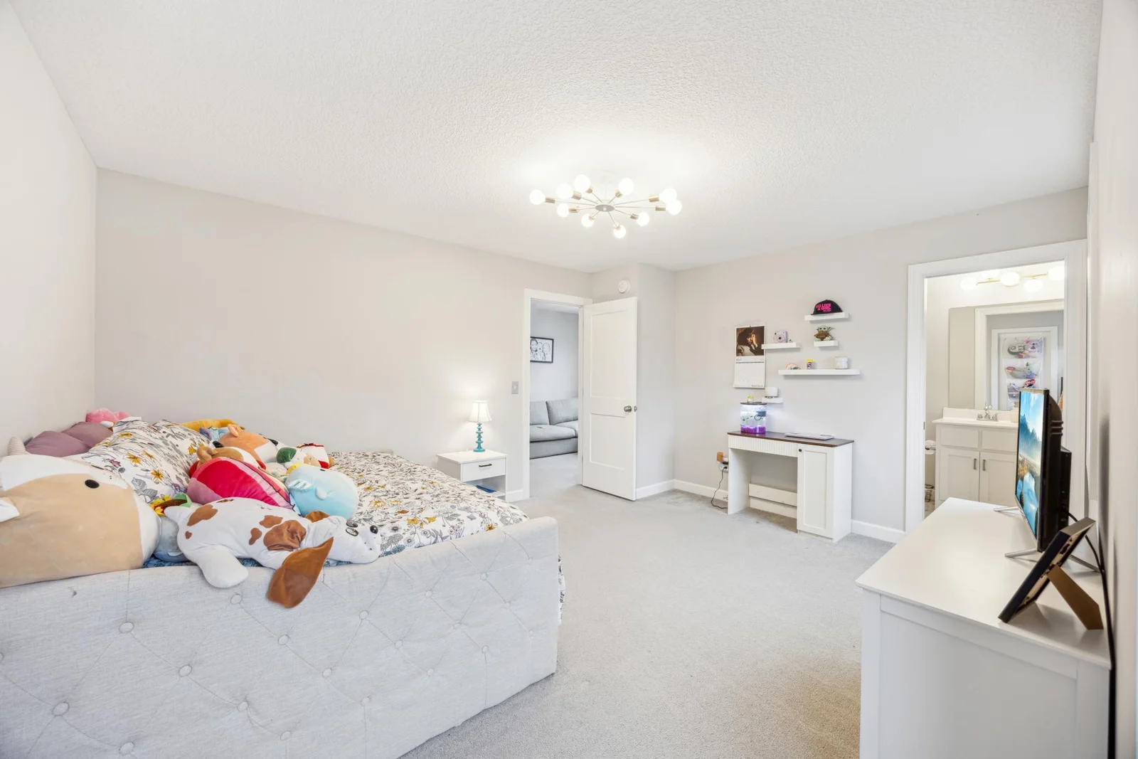 Another 2nd floor bedroom - this one with its own bath! There are four beds, including the primary on the second level!