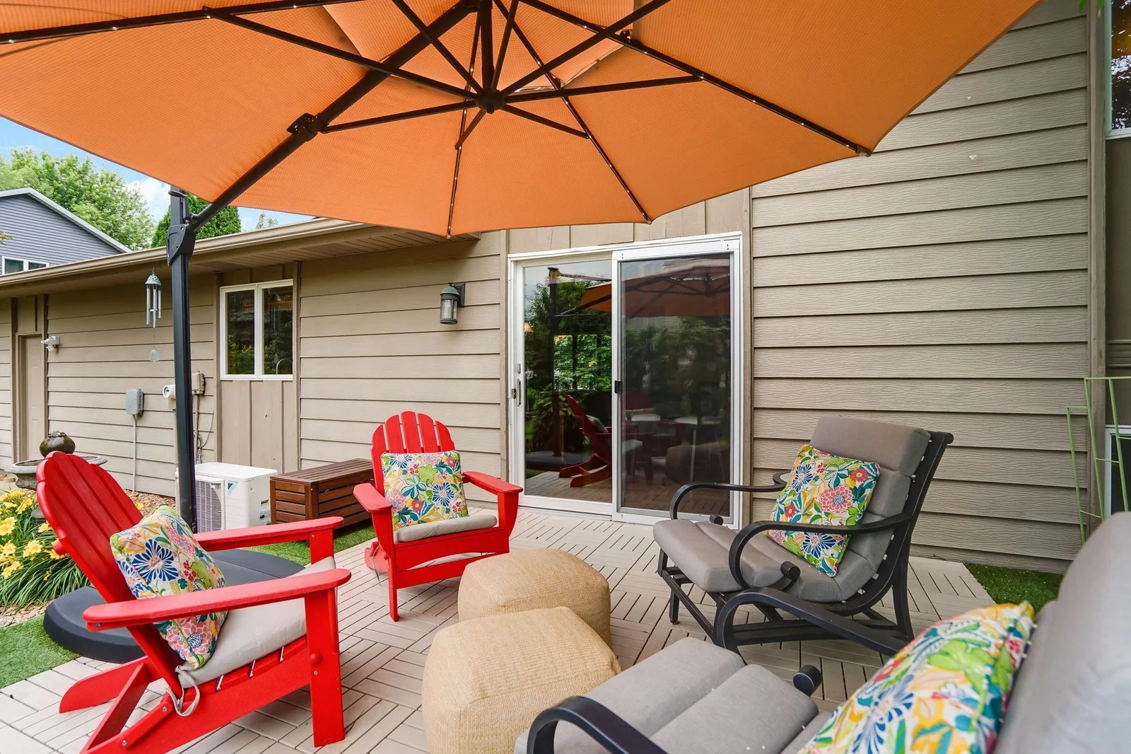 The patio off the dinette. Also: New shingles in 2025, in-ground sprinklers, new concrete driveway and garage floor.
